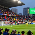 Exciting live soccer match scene showcasing fans, players, and nowgoal updates in a vibrant stadium atmosphere.