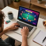 Player engages in online casino gaming at home with 88aa poker interface displayed on laptop.